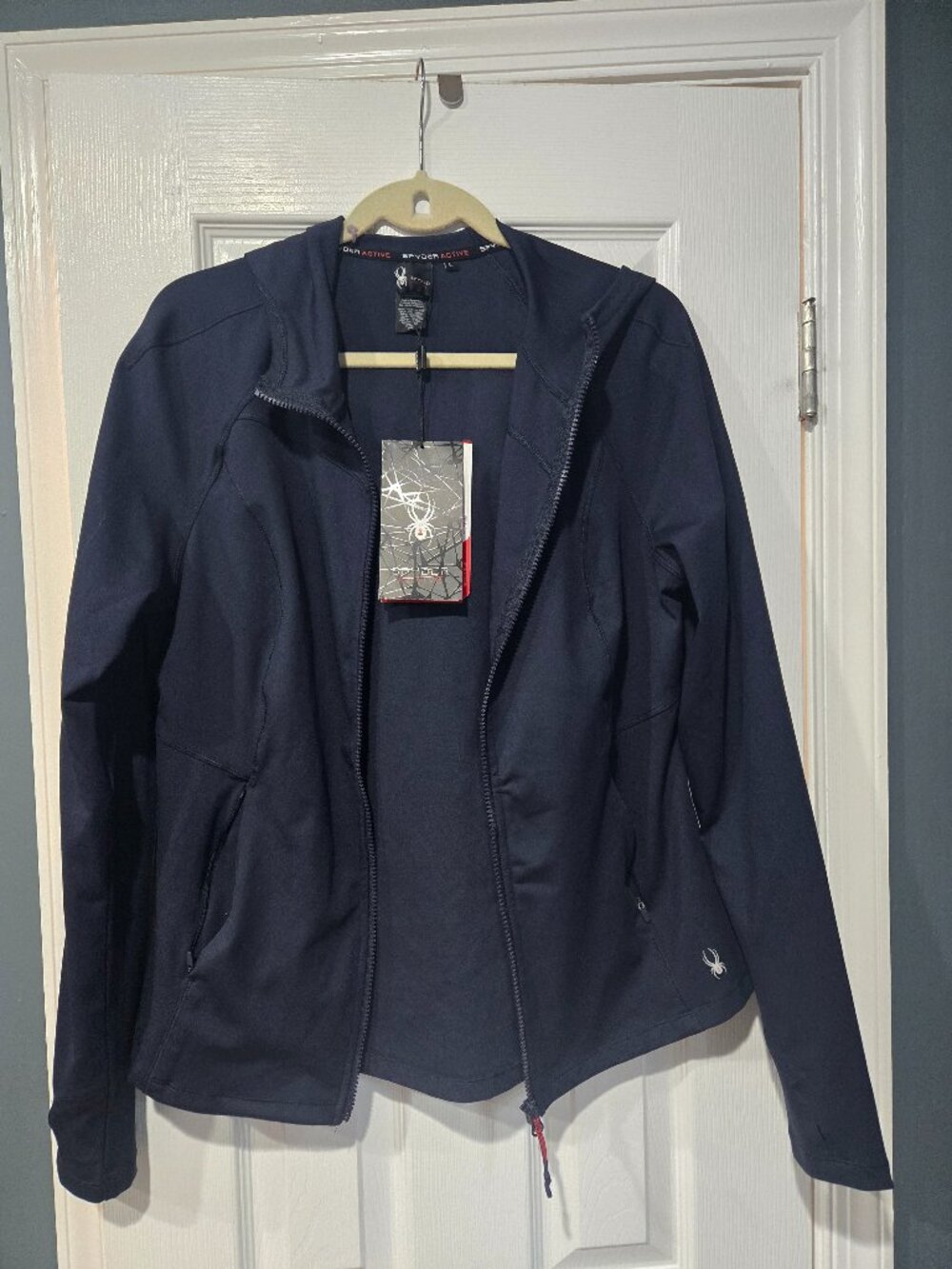 Spyder ladies zip up with hood NEW WITH TAGS